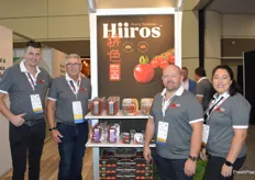 Niels Klapwijk, Ray Wowryk, John Ketler and Zanelle Hough with Nature Fresh Farms are proudly standing next to a display of Hiiros Cherry Tomatoes. Hiiros were launched this year. 